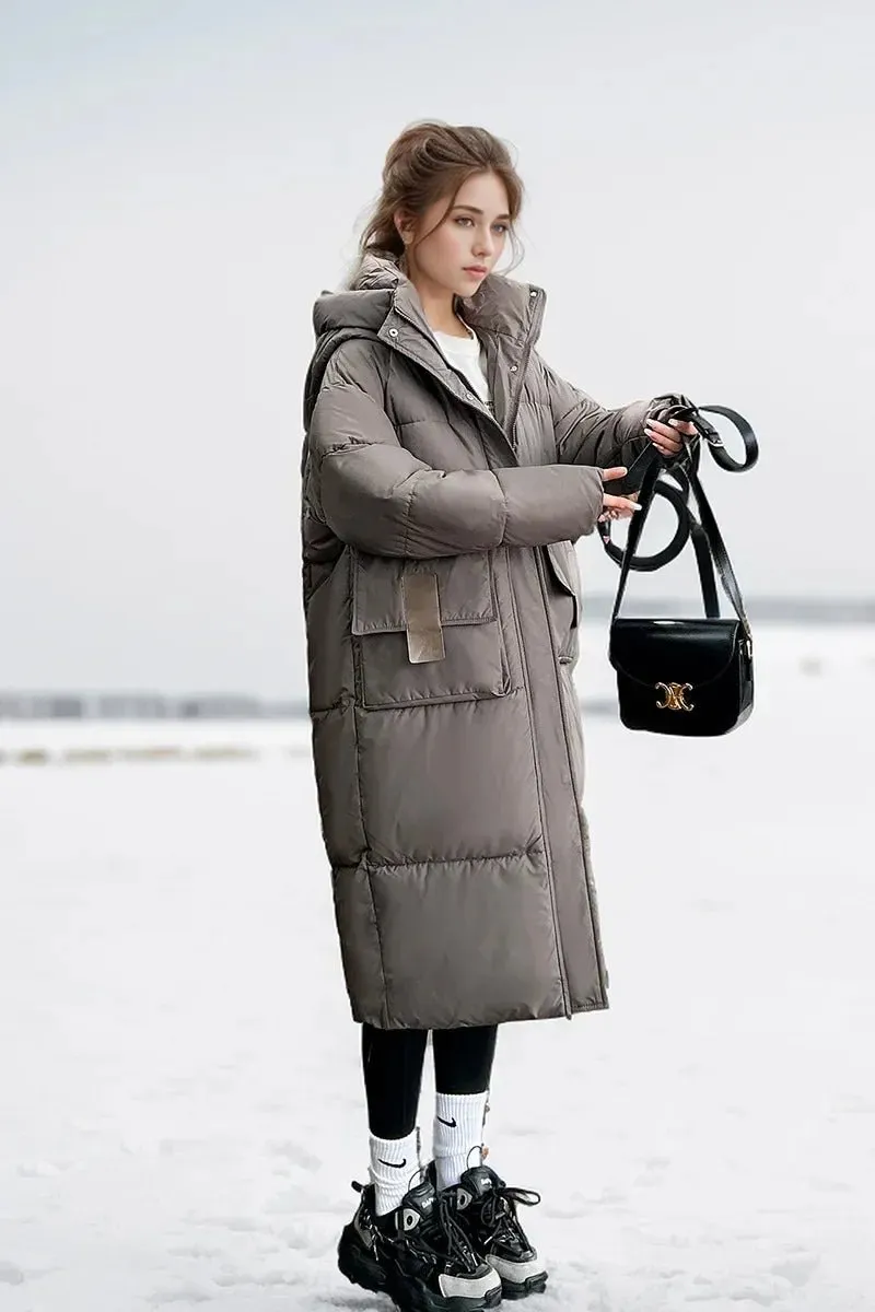 2024 neue Frau Daunen Baumwoll jacke Winter langen Mantel Kapuze große Taschen Mode warme dicke Reiß verschluss Mantel weiblichen Wintermantel