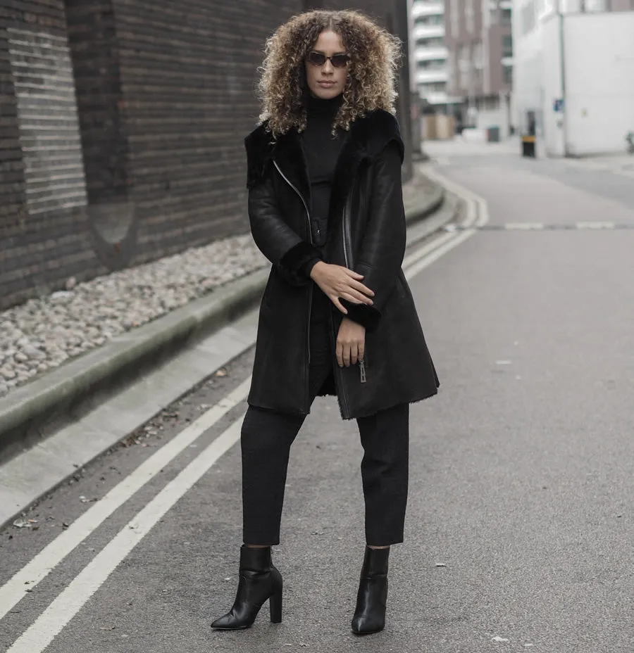 Shearling leather hooded coat in black