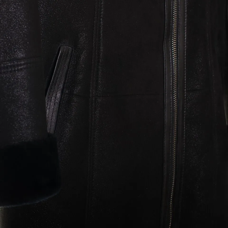 Shearling leather hooded coat in black
