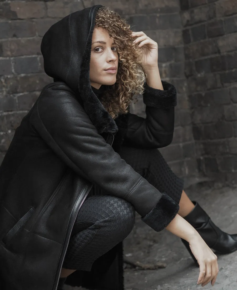 Shearling leather hooded coat in black